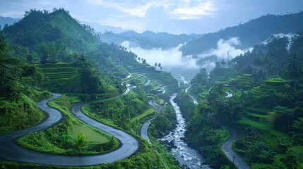 Fototapeta premium Serene Winding Road Through Lush Green Rice Terraces and Mountains