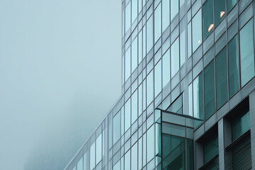 Obraz premium Glass facade of modern building, showcasing geometric design and reflections, symbolizing urban architecture, business, and corporate success