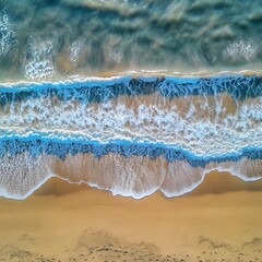 Obraz premium Aerial View of Ocean Waves Crashing on Sandy Beach