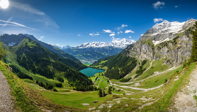 panorama of circular deep valley basin of reutte and breitenwang with lake urisee at sunny spring day