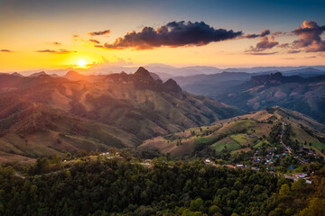 Rural landscape of sunset over rolling mountain with local village in the valley at Gigokor viewpoint