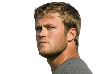 Profile portrait of a man looking determined, showcasing confidence and strength against a white isolated background.