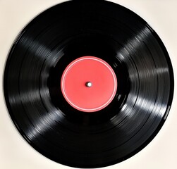 Obraz premium Vintage Black Vinyl Record with Red Label