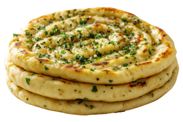 Delicious garlic naan bread golden brown layered with fresh herbs a culinary delight against a black