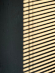 Shade and shadow on wall from a window roller shutter. Attractive half frame composition
