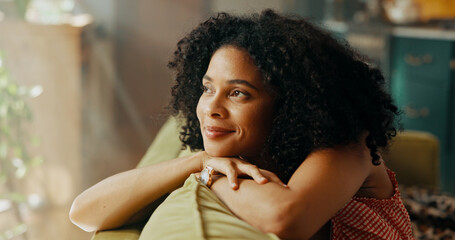 Happy woman, thinking and relax with sofa for dream, holiday or weekend break at home. Female person, thoughtful or wonder with smile in comfort for rest, memory or peaceful moments on couch at house