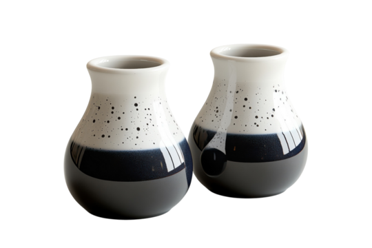 Elegant ceramic vases minimalist design black and white speckled glaze studio lighting smooth curves