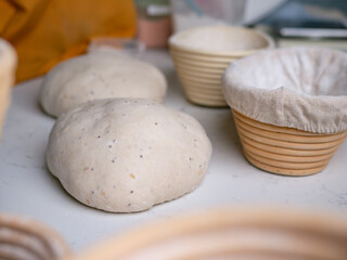 Sourdough Bread in Proofing basket, bannetons baskets for retarding raw dough before baking.