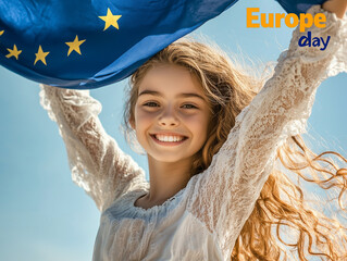 Smiling girl holding european union flag celebrating europe day
