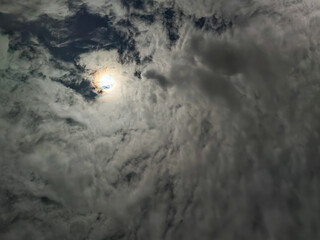 cloudy night sky with full moon