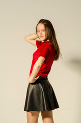 Portrait of young beautiful girl. Photo-shoot executed in the studio.