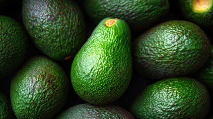 Fresh Green Ripe Avocados in a Close up View Showcasing Their Rich Texture and Color