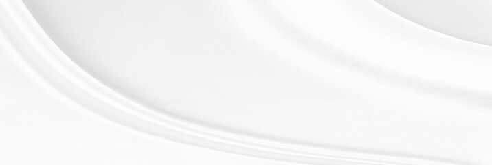 White gray satin texture that is white silver fabric silk panorama background with beautiful soft blur pattern natural.