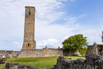 The ruins of St Andrews Cathedral overlook the sea, surrounded by ancient tombs and old stone...