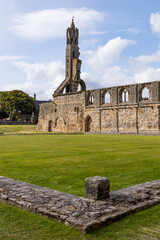 The ruins of St Andrews Cathedral overlook the sea, surrounded by ancient tombs and old stone...