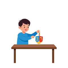 Boy playing with colorful dreidel at a wooden table in flat vector art