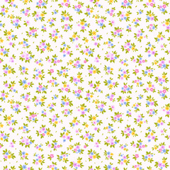 Beautiful floral pattern in small bright flowers. Small yellow, pink and blue flowers. White background. Ditsy print. Floral seamless background. Gentle template for fashion prints. Stock
