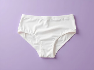 Top View of White Cotton Classic Panties on Pastel Violet Background
