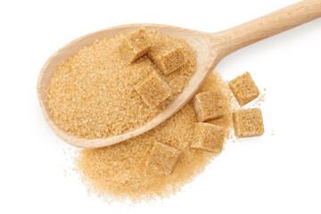 Pile of brown granulated sugar and sugar cubes in wooden spoon isolated on white background. Top view, flat lay