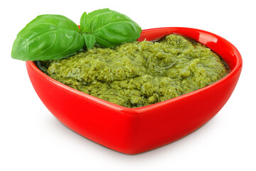 Pesto sauce in ceramic bowl isolated on white background. Top view. Flat lay