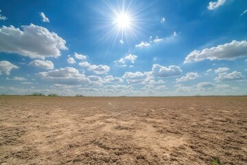 Fototapeta premium Vast, arid landscape under a vibrant blue sky