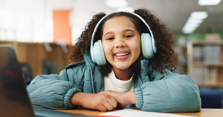 Elearning, laptop and portrait with girl in library for homework assessment, education portal and...