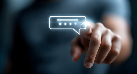 A fingertip gently touches a glowing digital message bubble, signifying seamless communication and connection in the digital age.