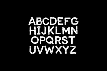 Obraz premium ChalkMark - Bold Distressed FontA bold, distressed font with a chalky style on a black backdrop.