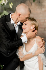 Attractive young couple in love kissing and hugging