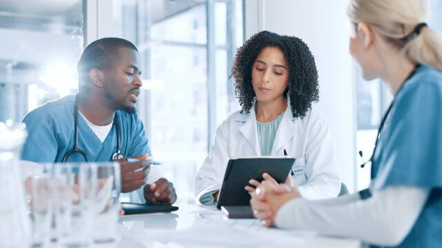 Speaking, medical team or doctors in meeting with tablet, planning or health treatment results in group. Clinic, help or people in discussion for healthcare advice, schedule or diagnosis research