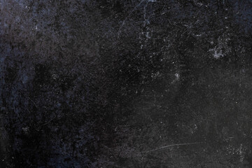 black enameled metal with stains and scratches