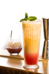 Fototapeta premium Refreshing Tropical Cocktail with Mint Garnish