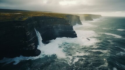 Dramatic Coastal Waterfall Crashing into Turbulent Ocean Waves at Rugged Cliffs