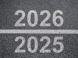 Change of year. Arrival of 2026 season. Number 2026 on asphalt. New year is approaching. Business...