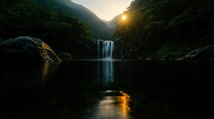 Fototapeta premium A scenic waterfall cascades down a rocky mountain into the serene water