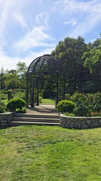 footage of a gorgeous spring landscape with a gazebo, lush green trees and colorful flowers at Descanso Gardens La Ca&ntilde;ada Flintridge California USA