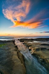 sunset over the sea with dramatic cloud