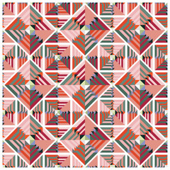 Fototapeta premium Colorful geometric pattern featuring intricate diamond shapes in shades of pink, green, and red, arranged in a repeating design.