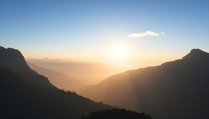 sun is setting over a mountain range