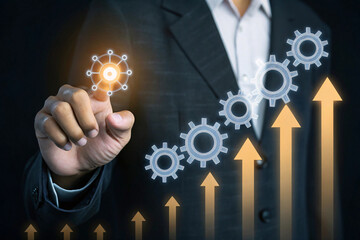 Business Growth Concept – Glowing Gears and Upward Arrows with Businessman Touching Interface