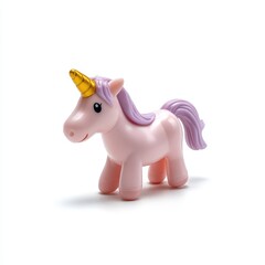 Fototapeta premium Pink unicorn toy with golden horn on a white background.