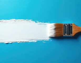 Brush stroke creates space white paint on blue background. Artistic tool draws copy space for text. Painter paintbrush, art, design element, modern creative background for ad banners, brand