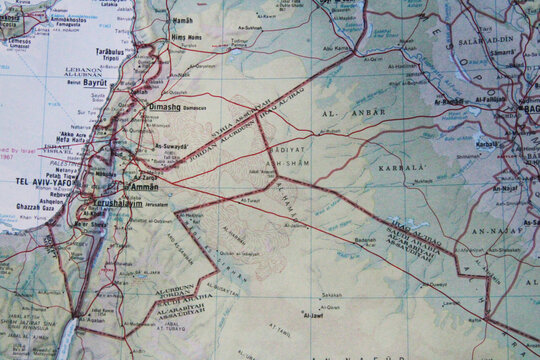 Vintage political map showing the Middle East region, including Israel, Palestine, Jordan, Syria, Iraq, and Saudi Arabia, with major cities such as Jerusalem, Amman, Damascus, Baghdad, and Karbala.