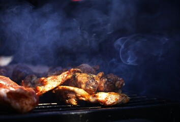 Juicy steaks sizzling on an outdoor grill. Smoky flavor, open fire, and perfect sear—authentic barbecue in nature. Great for food, camping, and outdoor cooking themes.