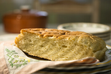 Close-up of freshly baked bread showing soft texture and golden crust