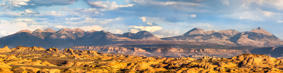Petrified Dunes and La Sal mountain range panorama in Arches National Park, Utah. The formations...