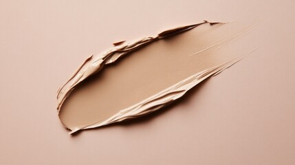 Beige Beauty: Swatch of Cosmetic Foundation on a Neutral-Toned Background