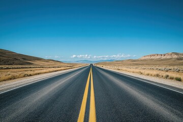 Fototapeta premium Empty highway stretches into vast horizon