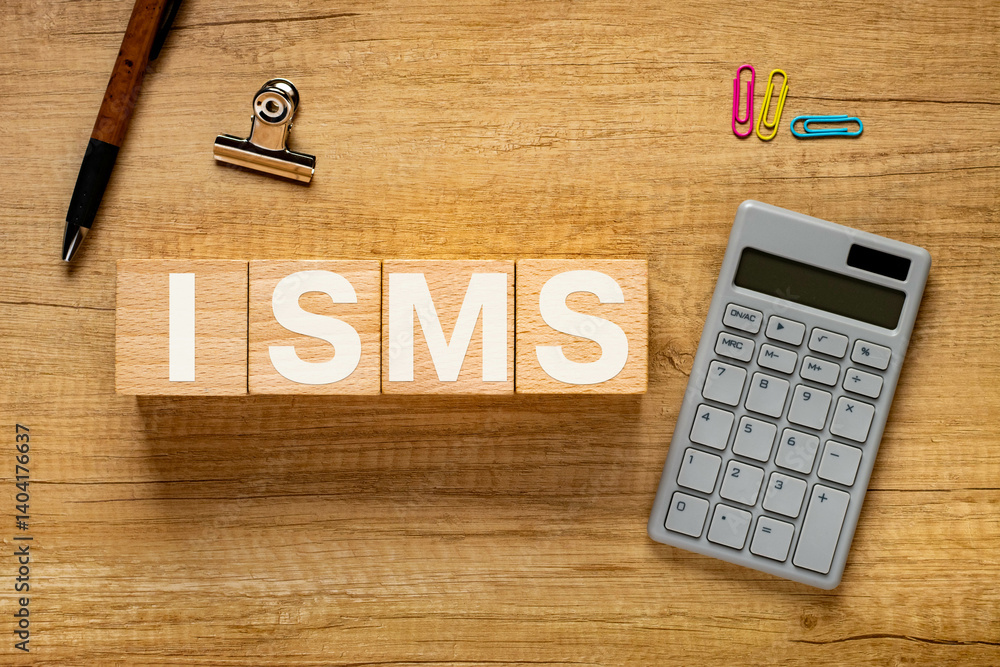 Poster there is wood cube with the word isms. it is an abbreviation for information security management sys