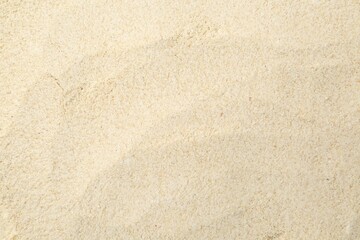 Superfood product. Sesame seeds powder as background, closeup